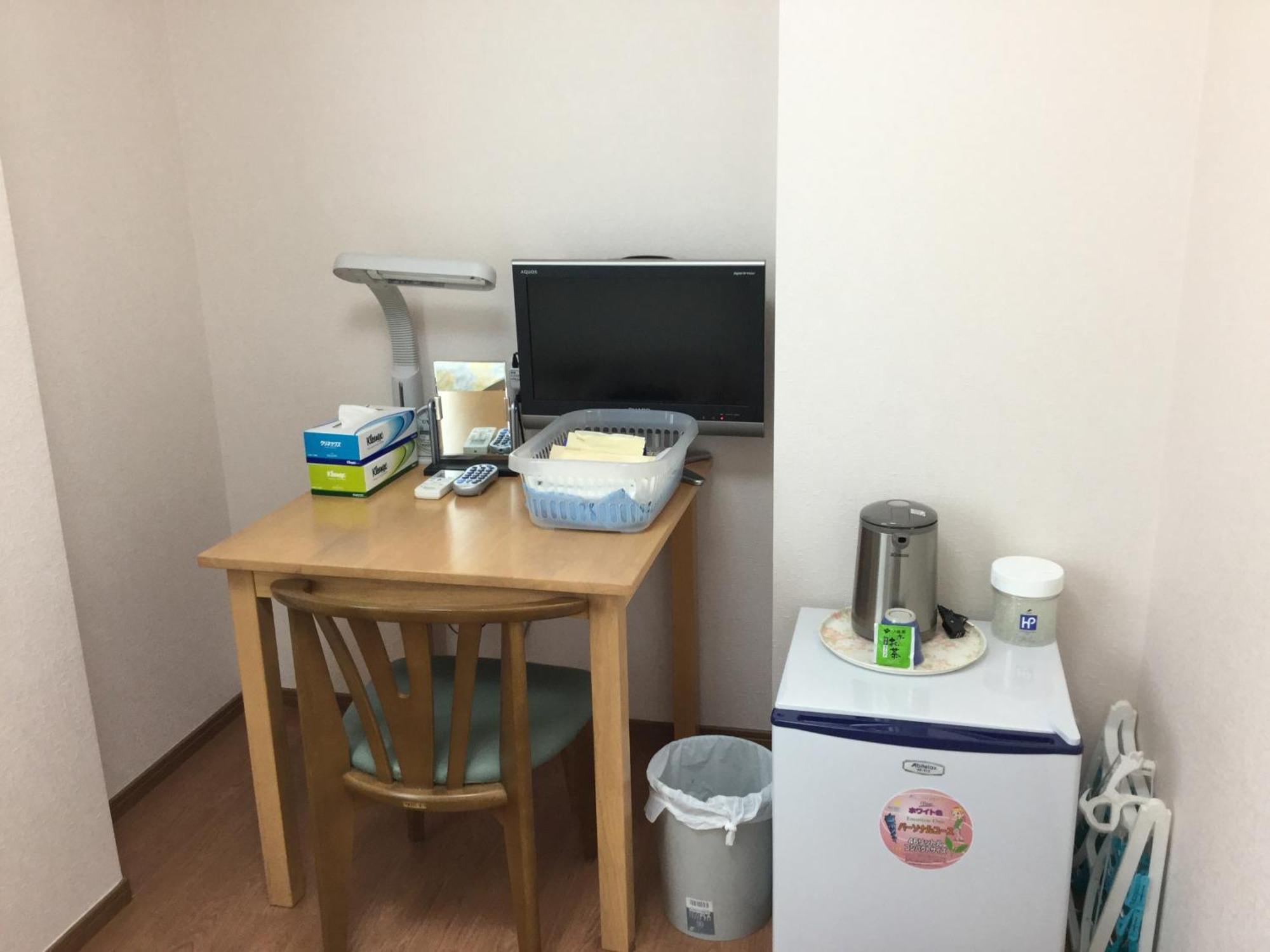 Business Inn Grandeur Fucsu Szoba fotó