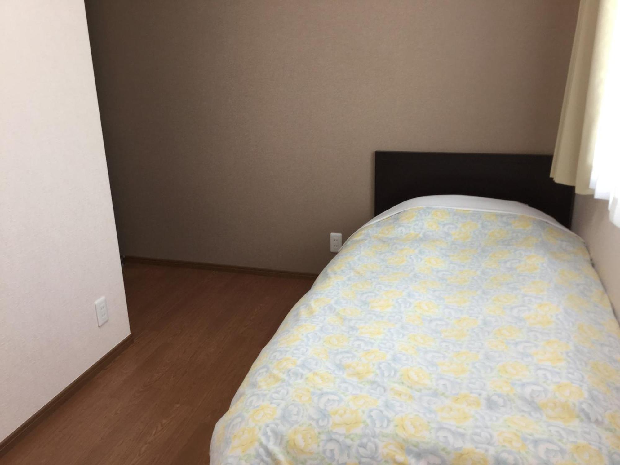 Business Inn Grandeur Fucsu Szoba fotó