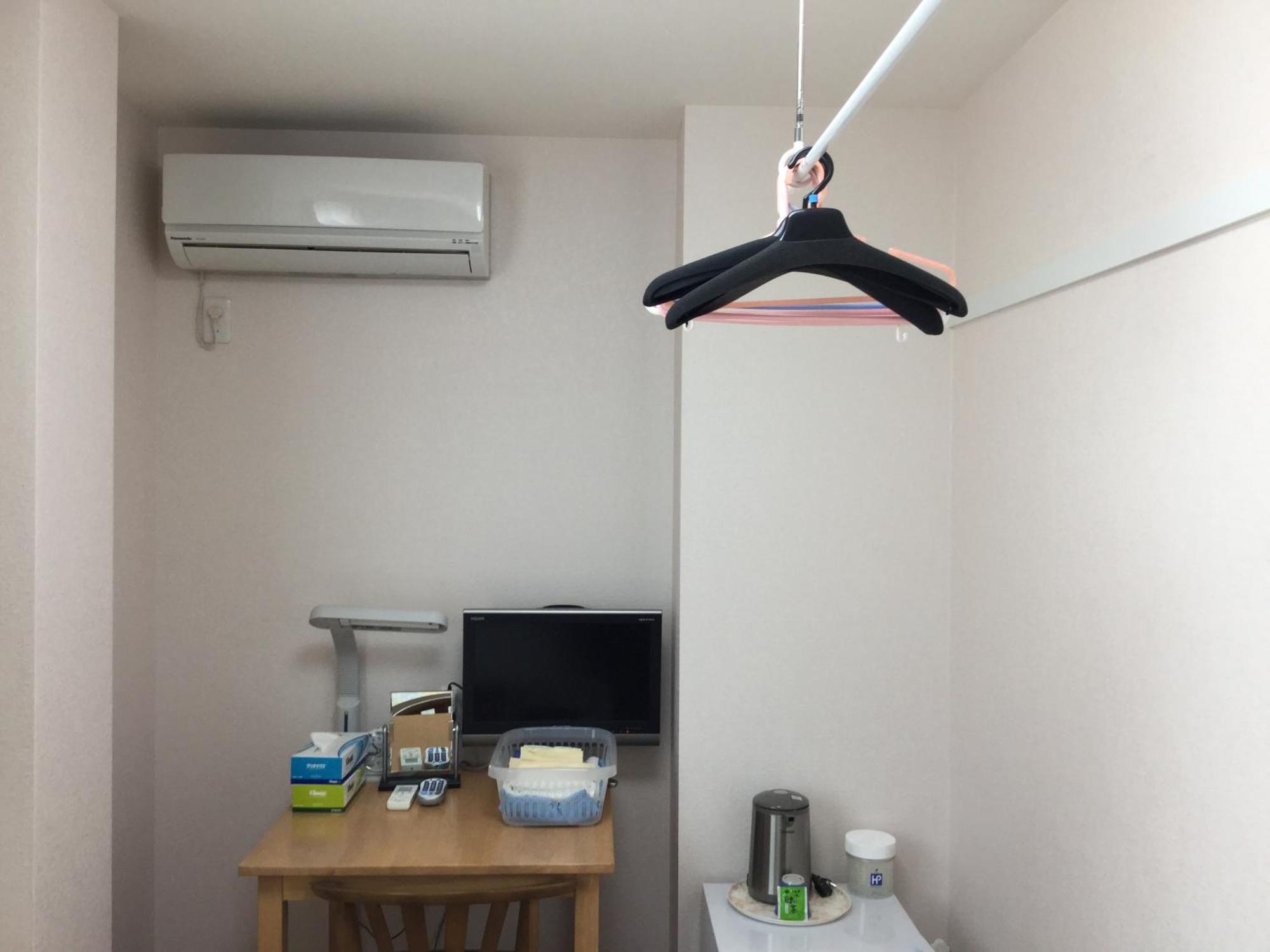 Business Inn Grandeur Fucsu Szoba fotó