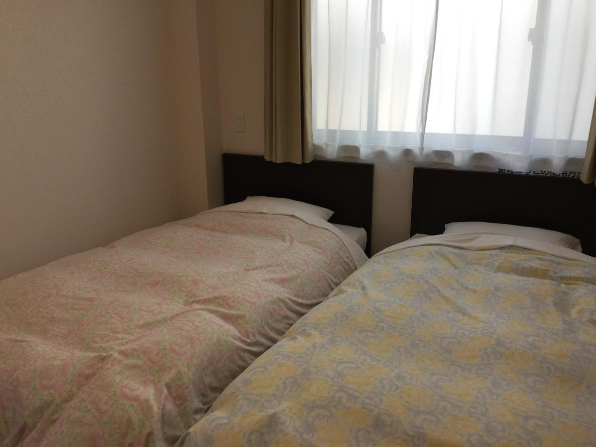 Business Inn Grandeur Fucsu Kültér fotó