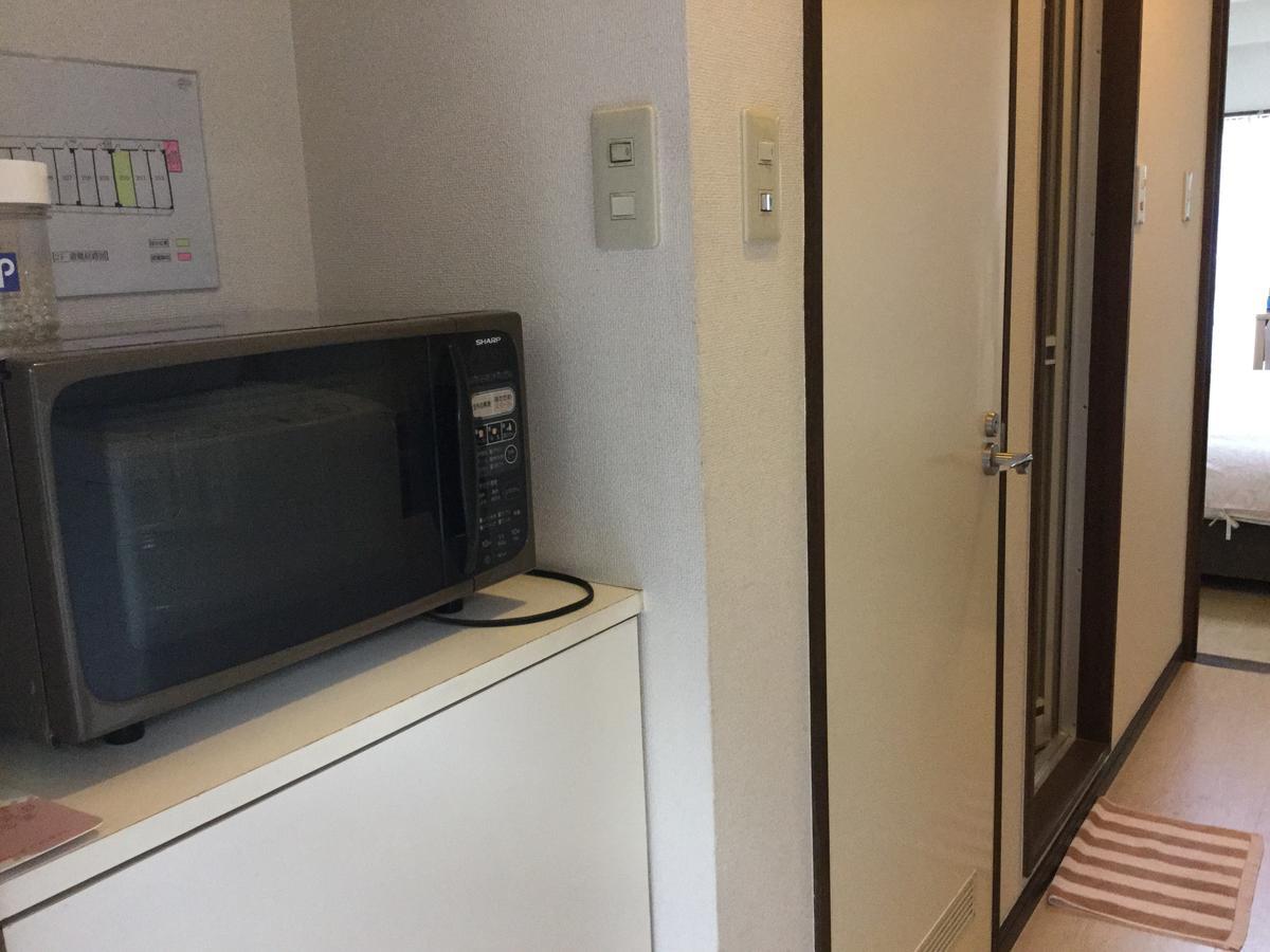 Business Inn Grandeur Fucsu Kültér fotó